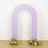 Purple arch with floral arrangements at the base on a plain backdrop.