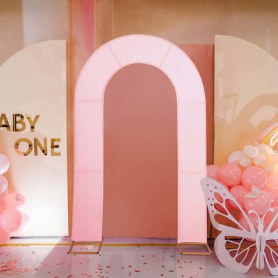 Pink arch backdrop for events and celebrations.
