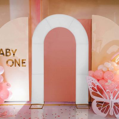 Party arch decoration for baby shower with pastel colors and balloons.