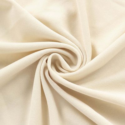 Beige fabric texture with soft folds and smooth surface.