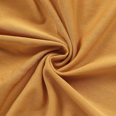 Soft golden fabric texture, perfect for crafting and fashion projects.