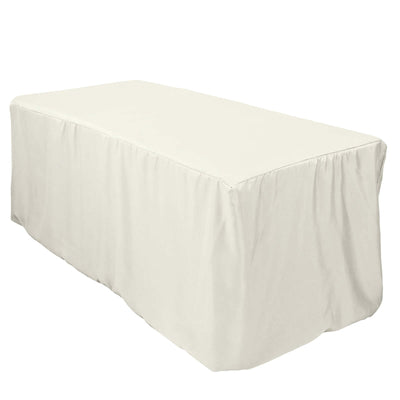 White tablecloth draped over a table in studio isolation shot.