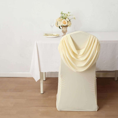 Elegant cream chair cover draped with soft fabric, styled for a sophisticated event.