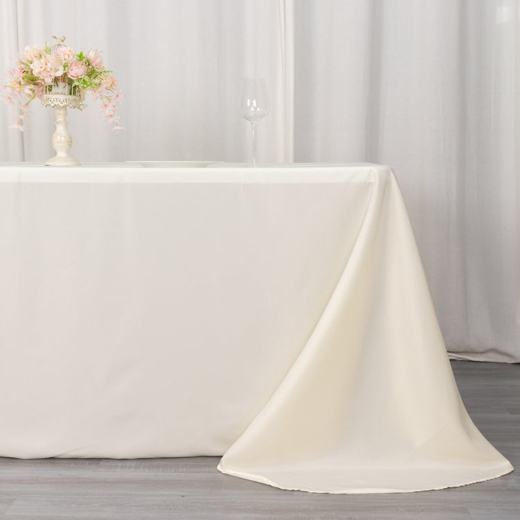 Round Corner 90 Inch x 132 Inch Rectangular Tablecloth In Ivory Polyester