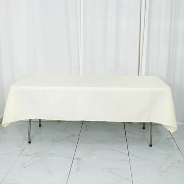 Elevate Your Event Decor with the Ivory Seamless Premium Polyester Rectangular Tablecloth