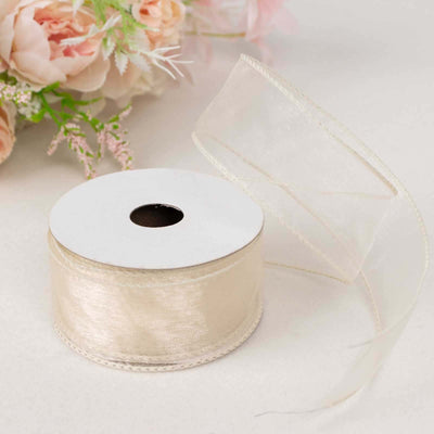 Cream satin ribbon roll with a delicate sheen, ideal for crafting and decorating.