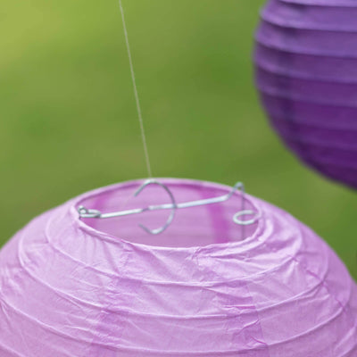 Purple paper lantern with metal hanging hook.