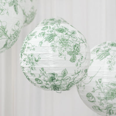 Floral paper lanterns in green and white hanging decoratively