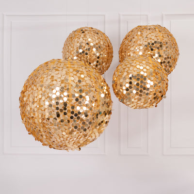 Gold sequined pendant lights in a modern design