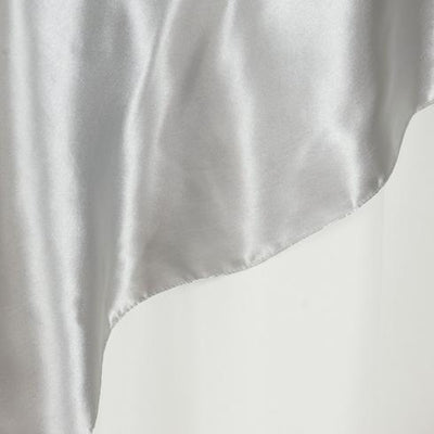 Silky silver fabric drape showing smooth texture and sheen.