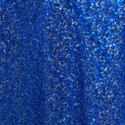 Blue sequin fabric texture with sparkling details.