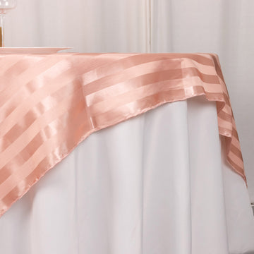 Create Lasting Impressions with the Dusty Rose Satin Stripe Square Table Overlay