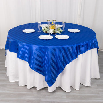 Create a Regal Ambiance with the Royal Blue Satin Stripe Square Table Overlay