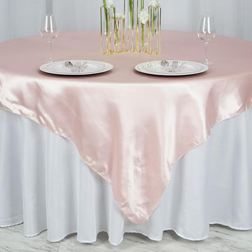 Enhance Your Table Decor with a Blush Satin Square Overlay