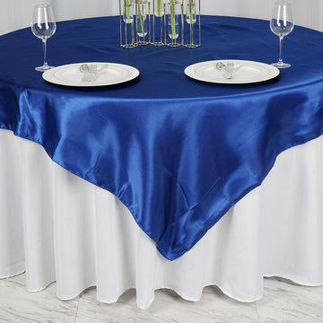 Create a Memorable Event with the Royal Blue Seamless Satin Square Tablecloth Overlay