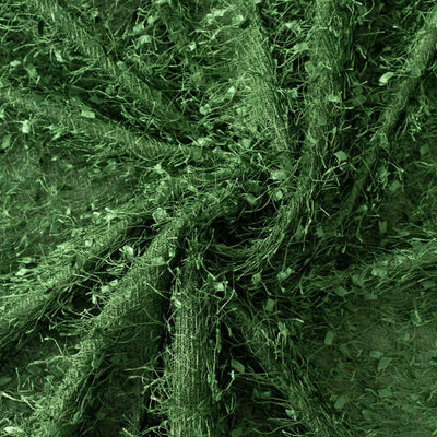 Green textured fabric with leaves and vines, perfect for crafts and decor.