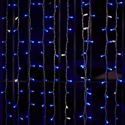 Blue and white LED string lights hanging against a dark background.
