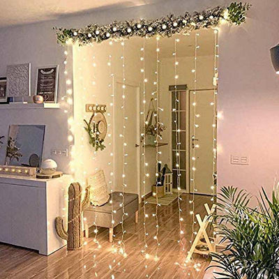 Decorative fairy lights hanging in a modern interior entrance.