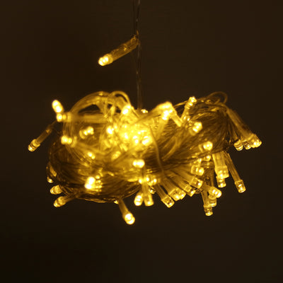 Warm white LED string lights in a decorative tangle.