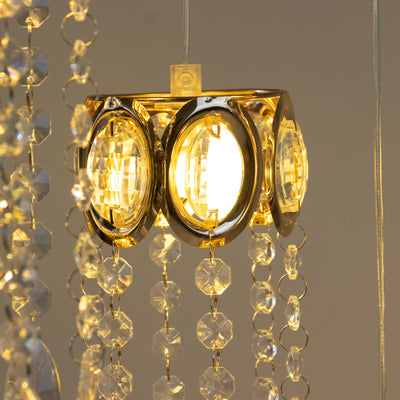 Elegant chandelier with crystal accents and warm light.