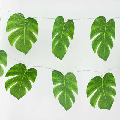 Monstera leaf garland decoration on a white background