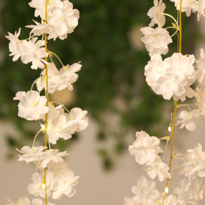 Artificial white flower garland with LED lights