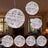 Decorative hanging light spheres in various sizes with colorful lights.