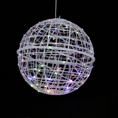 White decorative globe light with colorful LED accents hanging against a black background.