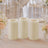 Three ivory flameless candles with floral wedding table decor
