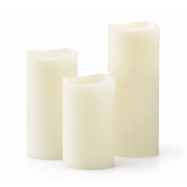 Three ivory flameless pillar candles on a white background#whtbkgd