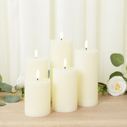 Set of 5 Ivory LED Flameless Pillar Candles – Battery Operated Flickering Candles, Real Wax Exterior, Ribbed Design, 4″–8″, Warm White