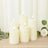 Set of five flameless ivory candles with realistic flickering flames.