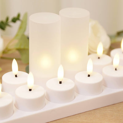 White LED candles in a decorative holder illuminating a soft ambiance.