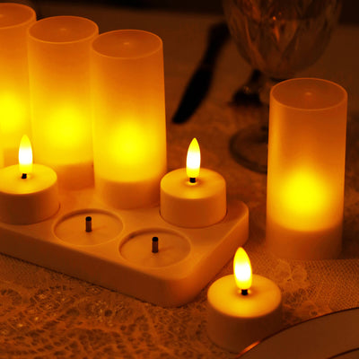LED flameless candles in various sizes with warm yellow glow.