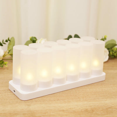 LED candle set on a white base with a soft glow.