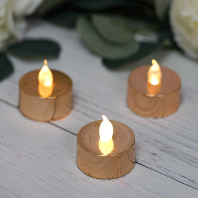 Gold LED tea light candles with flickering flame effect.