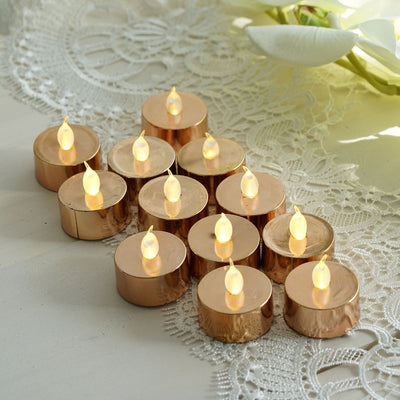 Set of 12 LED tealight candles in gold holders, ideal for decoration.