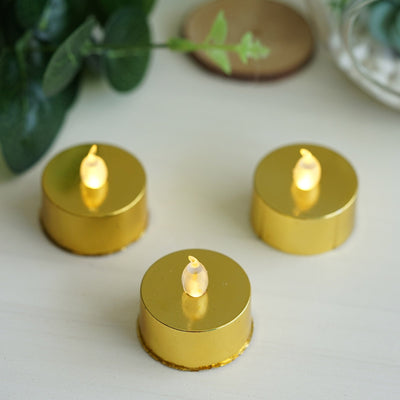 Golden LED tea light candles in a decorative arrangement.