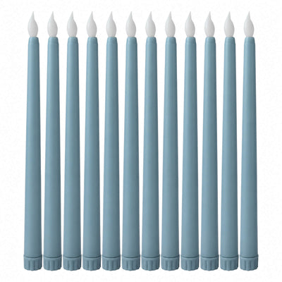 Set of 12 blue taper candles with white flames on a white background#whtbkgd