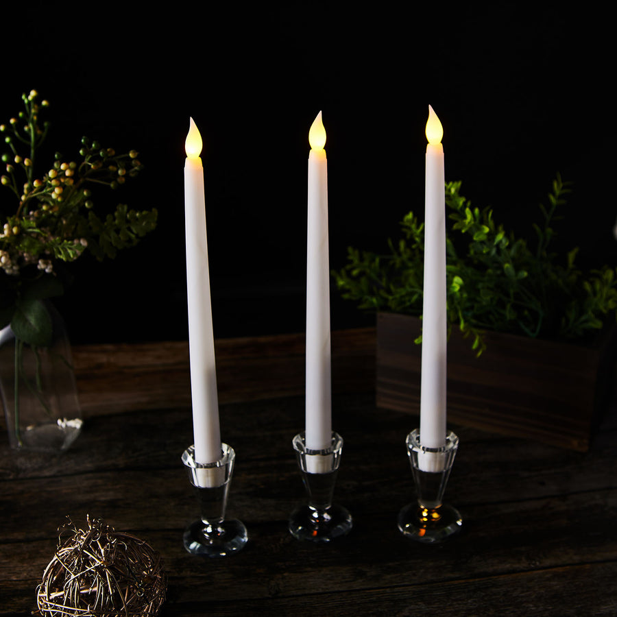 White flickering LED taper candles for a candlelit wedding reception