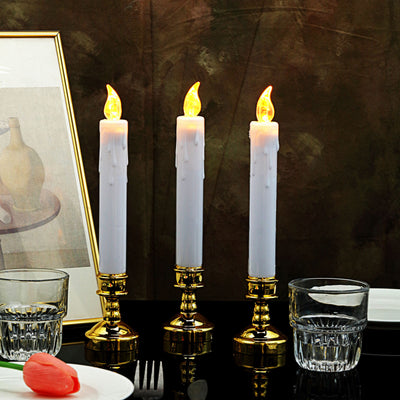 Elegant candle holders with flame-like lights, perfect for dining decor.