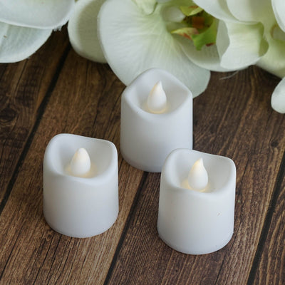 LED tealight candles in elegant white casing, perfect for home décor.