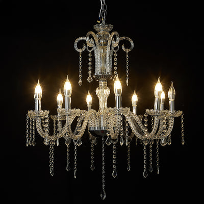 Elegant crystal chandelier with multiple lights and decorative chains. #whtbkgd