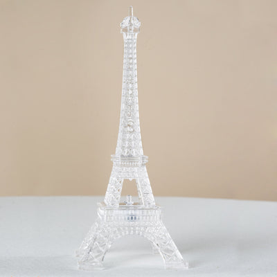 Clear Eiffel Tower model on a neutral background.