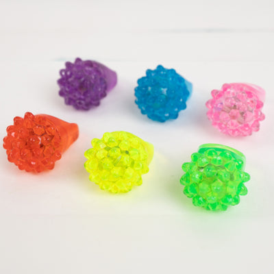 Colorful flower-shaped silicone ring set in vibrant hues