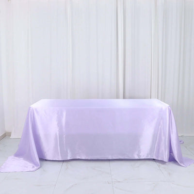 Lavender satin tablecloth draped elegantly over a table