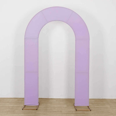 Purple fabric archway on a wooden floor against a white wall.