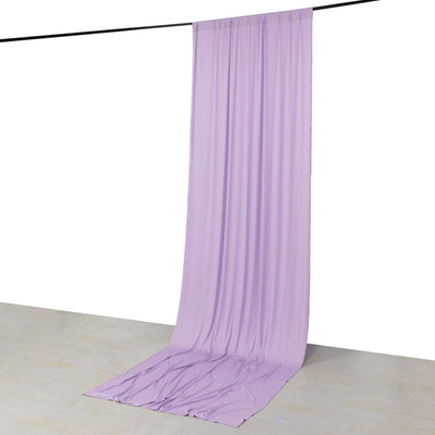 Purple fabric backdrop draped from a rod, ideal for photography setups.