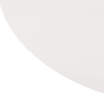 White circular surface on a plain backdrop.