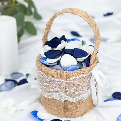 Hessian basket filled with blue and white flower petals.